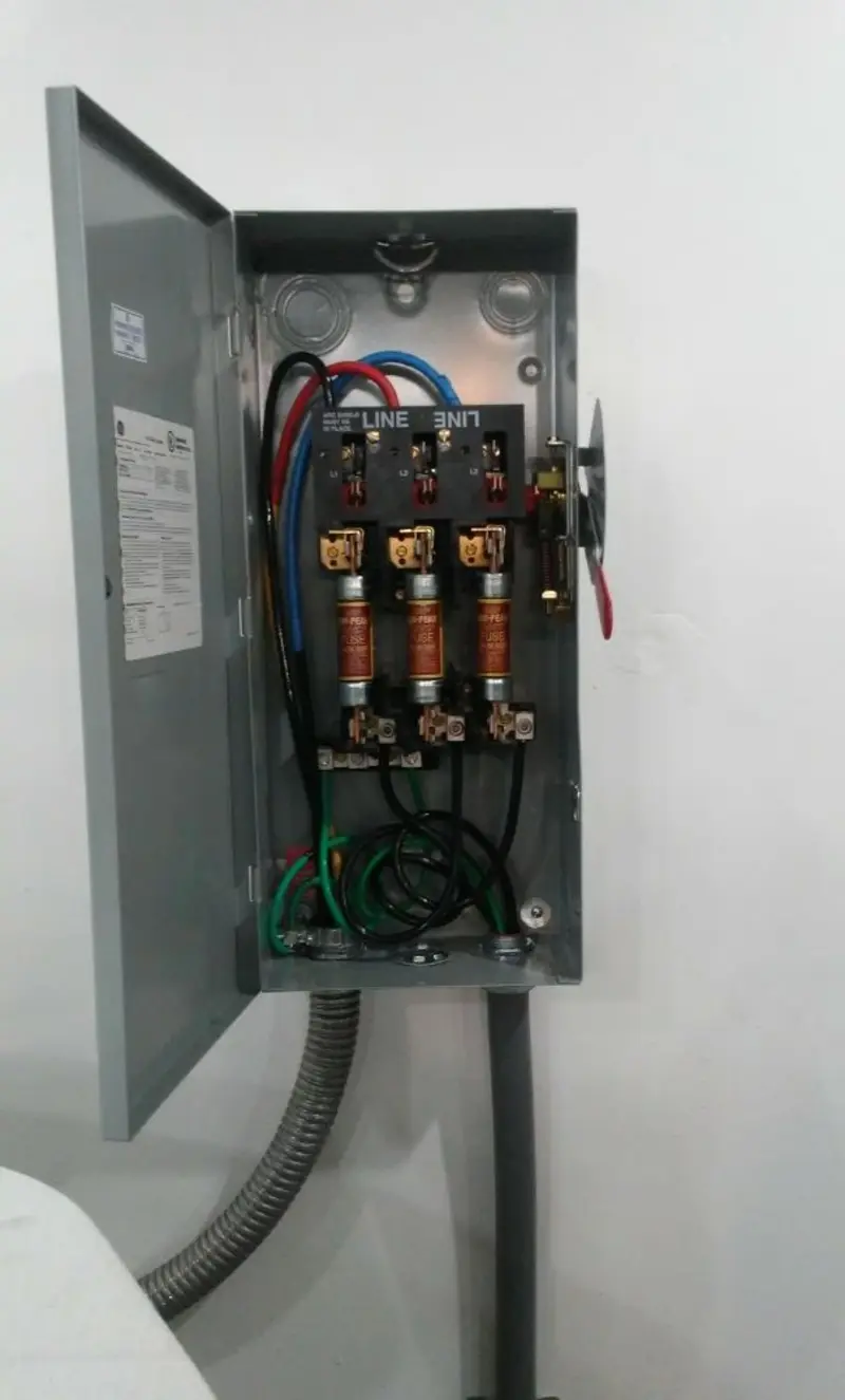 Three-phase disconnect switch installed for Smoke Detector Installation in Landmark